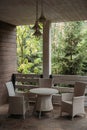 wicker chairs and round table on terrace Royalty Free Stock Photo