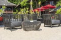 Wicker chairs and table in empty beach cafe next to sea. Close up. Thailand Royalty Free Stock Photo