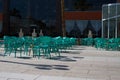 Wicker chairs and tables in an empty outdoor cafe Royalty Free Stock Photo