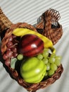 wicker cornacopia filled with fruit, and a turkey wicker basket Royalty Free Stock Photo