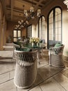 A wicker dining table with glass top and wicker chairs on a pillared terrace in the evening sun