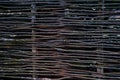 Wicker element of the fence. Ecological natural background