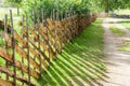 Wicker fence or lath near country road