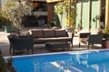 Wicker furniture sets by the pool Royalty Free Stock Photo