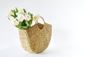 Wicker Handbag with Flowers Tulips, Spring Time, Summer Concept Royalty Free Stock Photo