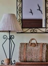 Wicker home decor items accessories on table in hallway