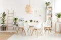 Wicker lampshade above table