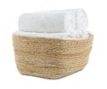 Wicker laundry basket with clean towels isolated on white Royalty Free Stock Photo