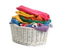 Wicker laundry basket with different clothes isolated Royalty Free Stock Photo