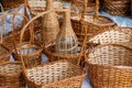 Wicker objects, baskets, glass, handmade by a folk craftsman, product Royalty Free Stock Photo