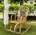 Wicker old wooden rocking chair Royalty Free Stock Photo