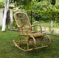 Wicker old wooden rocking chair Royalty Free Stock Photo