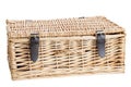 Wicker picnic basket with leather brass buckled straps. Royalty Free Stock Photo