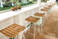 Wicker rattan chairs on bar counter. Trendy furniture design. Summer cafe Royalty Free Stock Photo