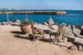 Wicker rattan old chairs on the beach Royalty Free Stock Photo