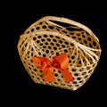 Wicker round bamboo basket on black Royalty Free Stock Photo