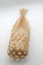 Wicker round bamboo basket on white background