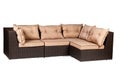 Wicker sofa with linen cushions in sand color