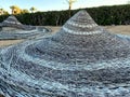 wicker straw hats parasols beach sand Royalty Free Stock Photo