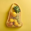 wicker string bag for fruits and vegetables. Ecological bag, eco food packaging made from recyclable materials. Royalty Free Stock Photo