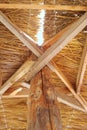 Wicker umbrella on a background of blue sky.