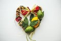 Wicker wreath with heart-shaped, decorated with leaves, lemon, dried lemon Royalty Free Stock Photo