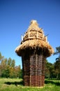 Wickerwork - a large basket with a thatched roof