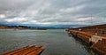 Wicklow Harbor Boat Launch next North Pier Breakwater wall and Lighthouse Royalty Free Stock Photo