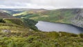 Wicklow way landscape Lough Tay Lake in a cloudy day Royalty Free Stock Photo