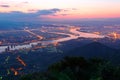 A wide aerial panorama of Taipei Basin with view of Guandu plain, Tamsui River and downtown area with Taipei 101