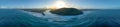 Wide aerial panorama of Tallebudgera creek mouth.