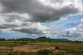 Wide angel shot of beautiful green mountain and dramatic cloud sky scenery Royalty Free Stock Photo