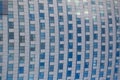 Wide angle abstract background view of steel light blue high rise commercial building skyscraper made of glass exterior Royalty Free Stock Photo