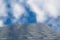 Wide angle abstract background view of steel light blue high rise commercial building skyscraper made of glass exterior Royalty Free Stock Photo