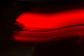 Wide Angle Abstract Red Blur background. Light and dark Red gradient Texture for Design. Glass of red wine close-up. Beautiful