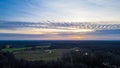 Dusk Descends: Serene Sunset Over a Vast Landscape Royalty Free Stock Photo