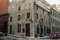 Wide angle of Corner Street, and Old Architectural buildings in the heart of Old Montreal - dec, 2019