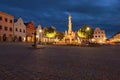 Wide angle evening landscape view of main square of Telc with Plague Column and renaissance and baroque colorful houses