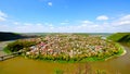 Wide angle landscape view of Zalishchyky town and canyon with Dnister River. Spring sunny landscape. Ternopil region, Ukraine. Royalty Free Stock Photo