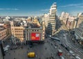 Wide angle morning aerial view of Plaza de Callao, Gran via and Jacometrezo street Junction. Madrid, Spain Royalty Free Stock Photo