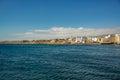 Wide angle panorama View of the volcanic beach towards the resort hotels, restaurants and terraces, in the bohemian village of El Royalty Free Stock Photo