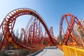Wide-angle perspective of a roller coaster\'s steep drop, capturing the thrill and exhilaration of the ride. Generative AI