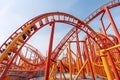 Wide-angle perspective of a roller coaster\'s steep drop, capturing the thrill and exhilaration of the ride. Generative AI