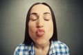 Wide angle portrait of kissing woman