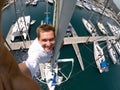 wide Angle selfie of man on the top of sailboat. Travel and adventure concept