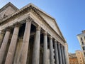 Wide angle shot of the facade with columns of the Pantheon in Rome