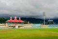 Wide angle shot of the famed dharamshala cricket stadium the worlds highest altitude stadium a tourism hotspot and landmark