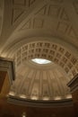 the ceiling of a large building with a skylight above