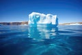 wide-angle shot of large iceberg surrounded by water