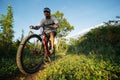 Wide angle shot. Mountain biking in nature.